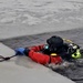 Firefighters on installation fire department dive team participate in ice rescue training at frozen lake at Fort McCoy