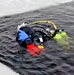 Firefighters on installation fire department dive team participate in ice rescue training at frozen lake at Fort McCoy