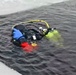 Firefighters on installation fire department dive team participate in ice rescue training at frozen lake at Fort McCoy