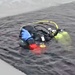 Firefighters on installation fire department dive team participate in ice rescue training at frozen lake at Fort McCoy