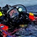 Firefighters on installation fire department dive team participate in ice rescue training at frozen lake at Fort McCoy