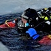 Firefighters on installation fire department dive team participate in ice rescue training at frozen lake at Fort McCoy