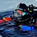 Firefighters on installation fire department dive team participate in ice rescue training at frozen lake at Fort McCoy