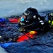 Firefighters on installation fire department dive team participate in ice rescue training at frozen lake at Fort McCoy