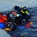 Firefighters on installation fire department dive team participate in ice rescue training at frozen lake at Fort McCoy