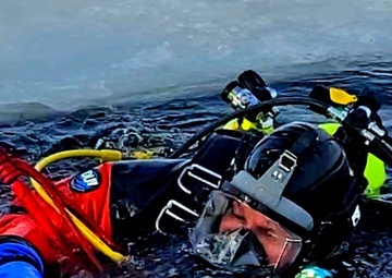 Photo Essay: Firefighters on installation fire department dive team participate in ice rescue training at frozen lake at Fort McCoy, Part I
