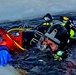 Firefighters on installation fire department dive team participate in ice rescue training at frozen lake at Fort McCoy