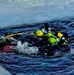 Firefighters on installation fire department dive team participate in ice rescue training at frozen lake at Fort McCoy