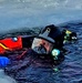 Firefighters on installation fire department dive team participate in ice rescue training at frozen lake at Fort McCoy