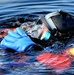 Firefighters on installation fire department dive team participate in ice rescue training at frozen lake at Fort McCoy