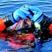 Firefighters on installation fire department dive team participate in ice rescue training at frozen lake at Fort McCoy