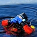 Firefighters on installation fire department dive team participate in ice rescue training at frozen lake at Fort McCoy