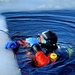 Firefighters on installation fire department dive team participate in ice rescue training at frozen lake at Fort McCoy