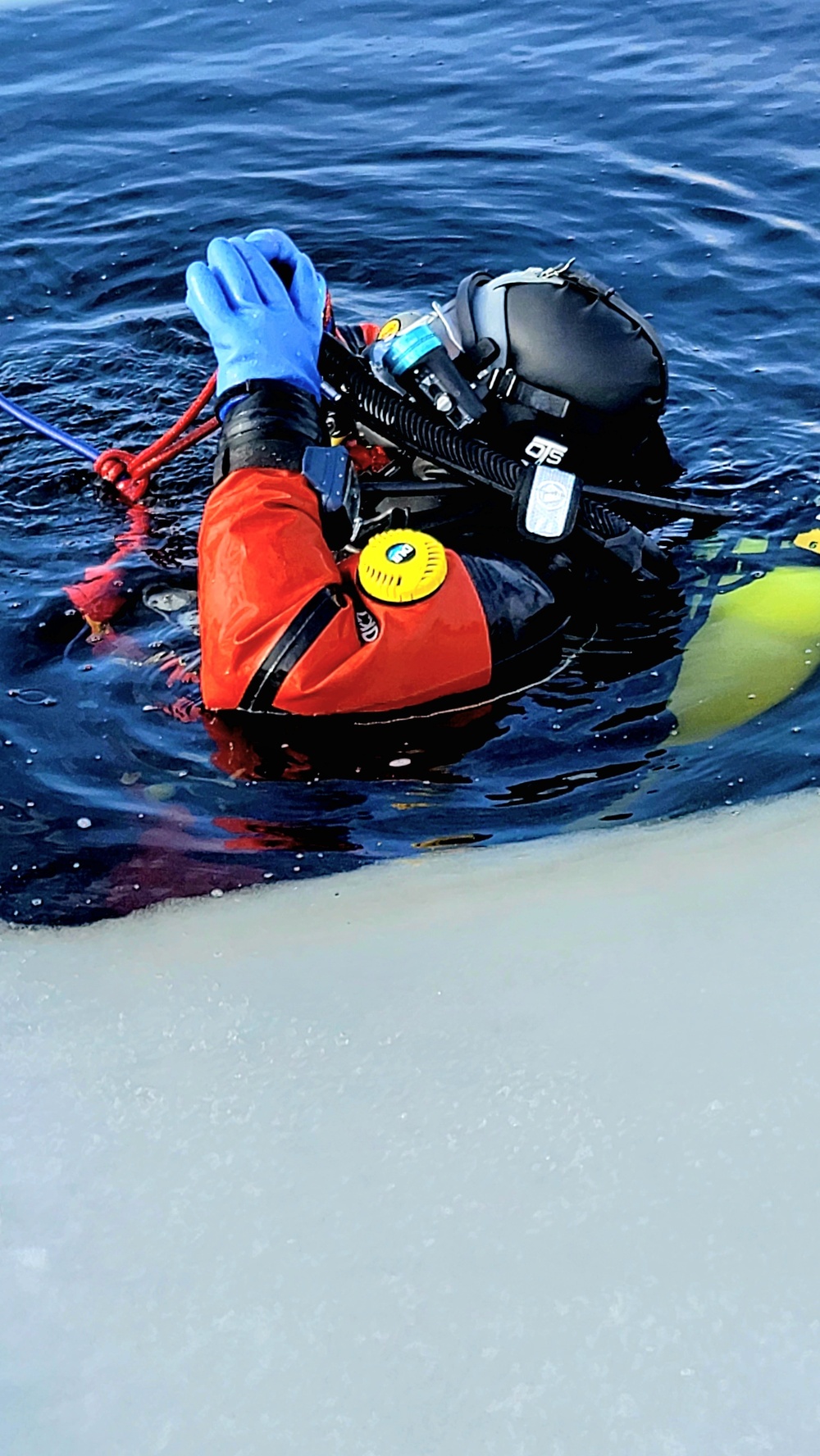 Firefighters on installation fire department dive team participate in ice rescue training at frozen lake at Fort McCoy