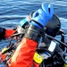 Firefighters on installation fire department dive team participate in ice rescue training at frozen lake at Fort McCoy