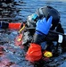 Firefighters on installation fire department dive team participate in ice rescue training at frozen lake at Fort McCoy