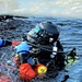 Firefighters on installation fire department dive team participate in ice rescue training at frozen lake at Fort McCoy