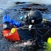 Firefighters on installation fire department dive team participate in ice rescue training at frozen lake at Fort McCoy