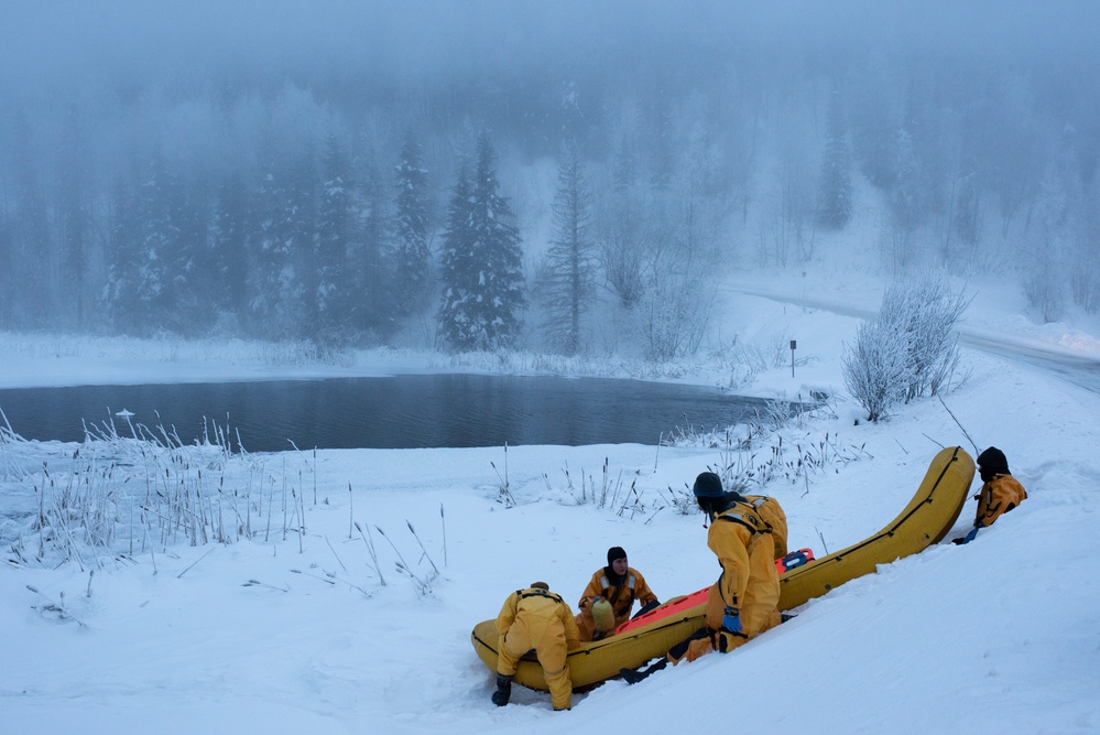 JBER firefighters conduct ice rescue training