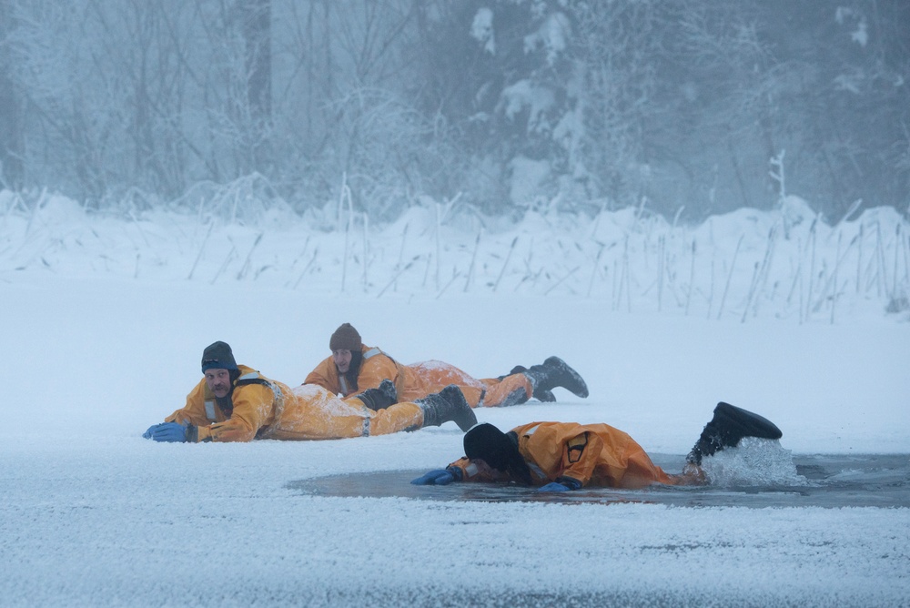 JBER firefighters conduct ice rescue training