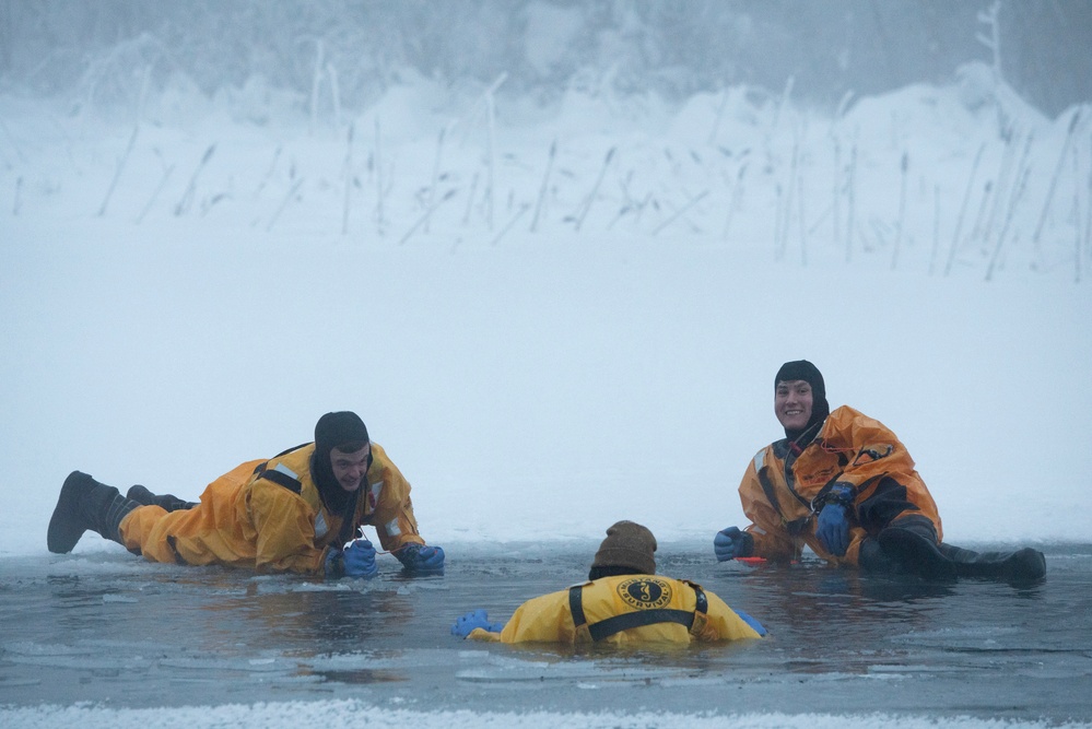 JBER firefighters conduct ice rescue training