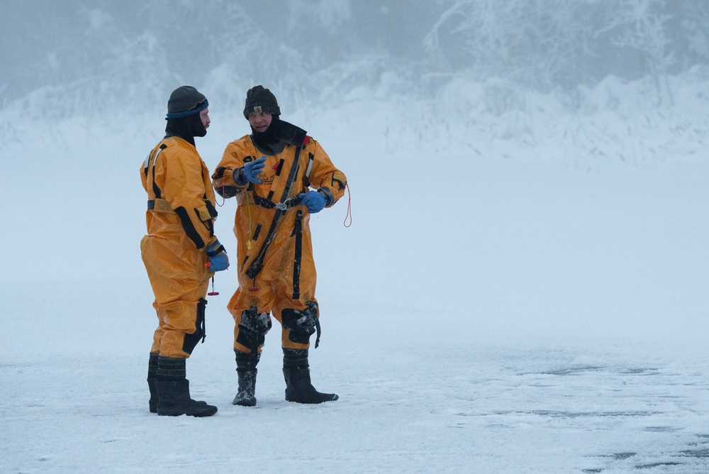 JBER firefighters conduct ice rescue training