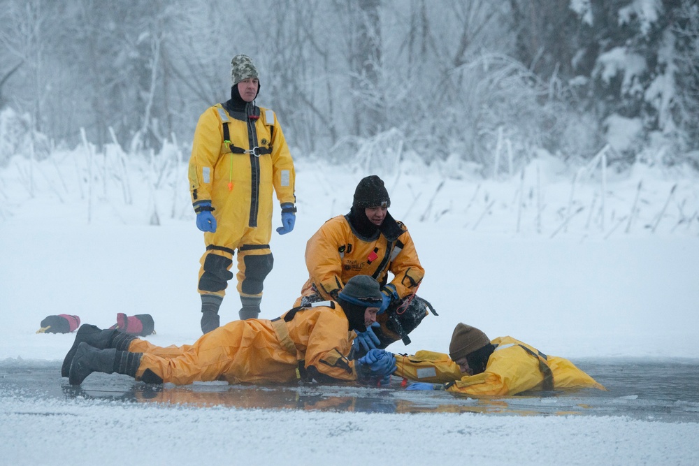 JBER firefighters conduct ice rescue training