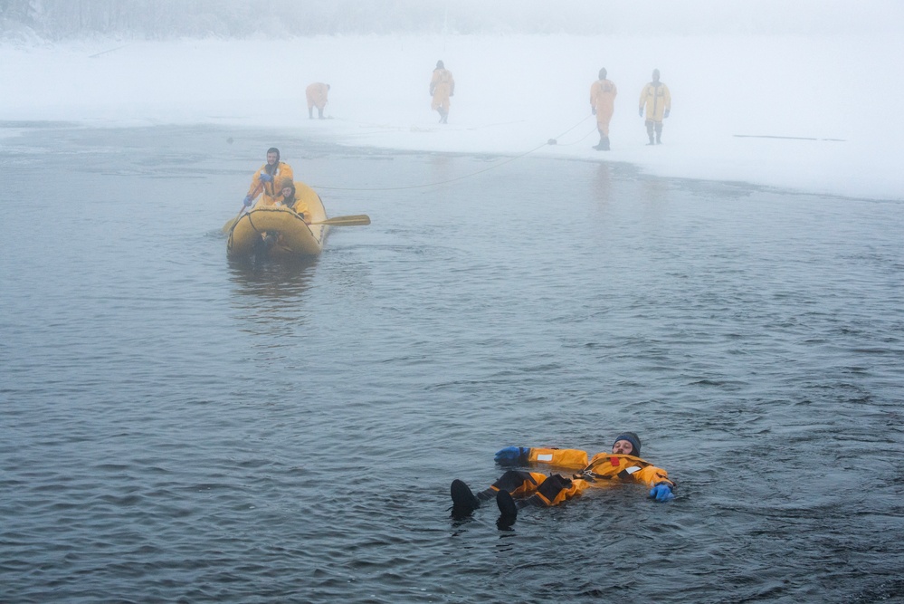 JBER firefighters conduct ice rescue training