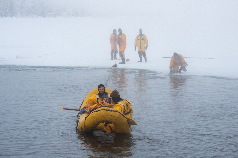 JBER firefighters conduct ice rescue training