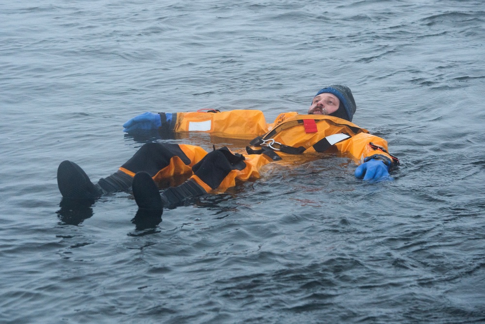 JBER firefighters conduct ice rescue training