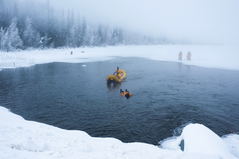 JBER firefighters conduct ice rescue training