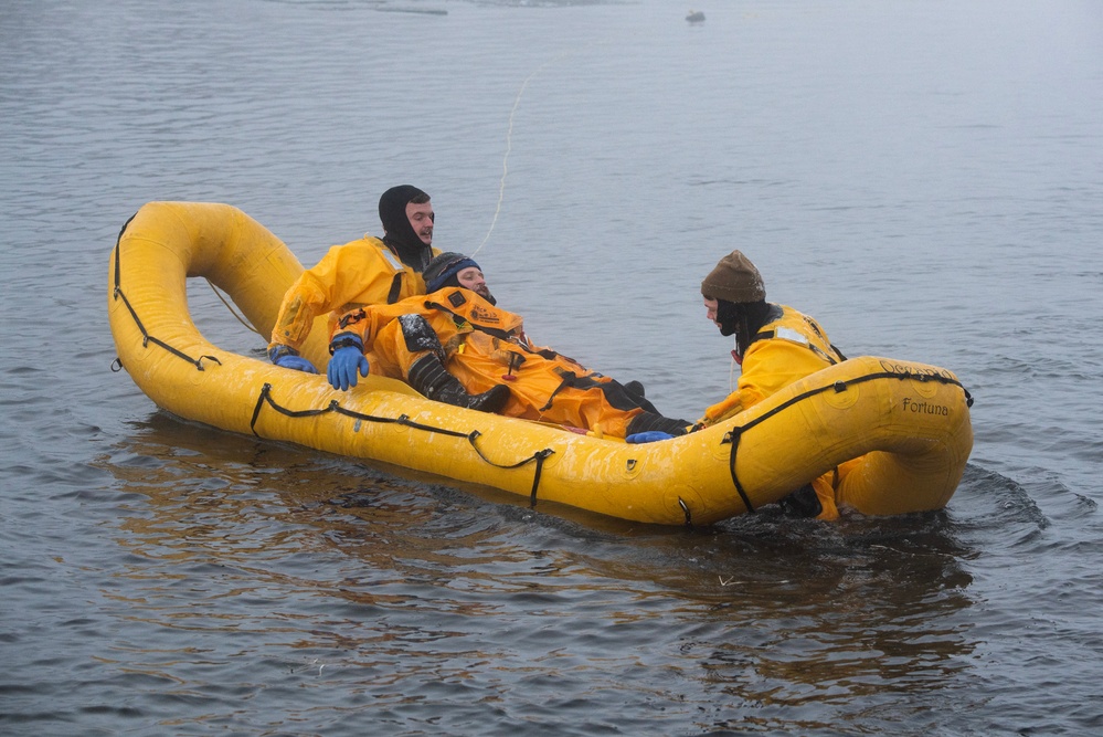 JBER firefighters conduct ice rescue training