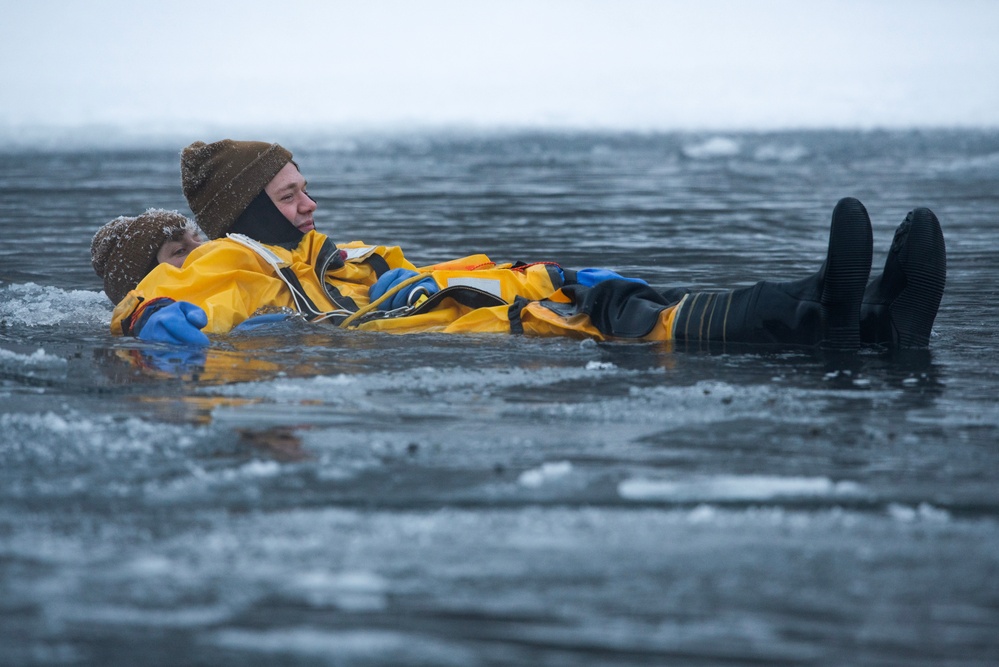 JBER firefighters conduct ice rescue training