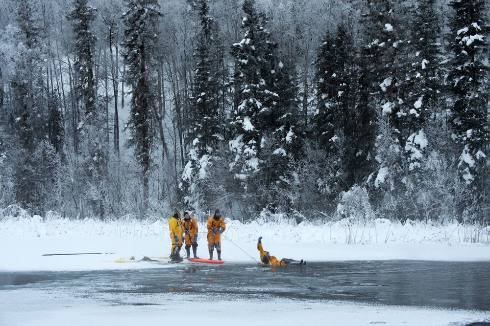 JBER firefighters conduct ice rescue training