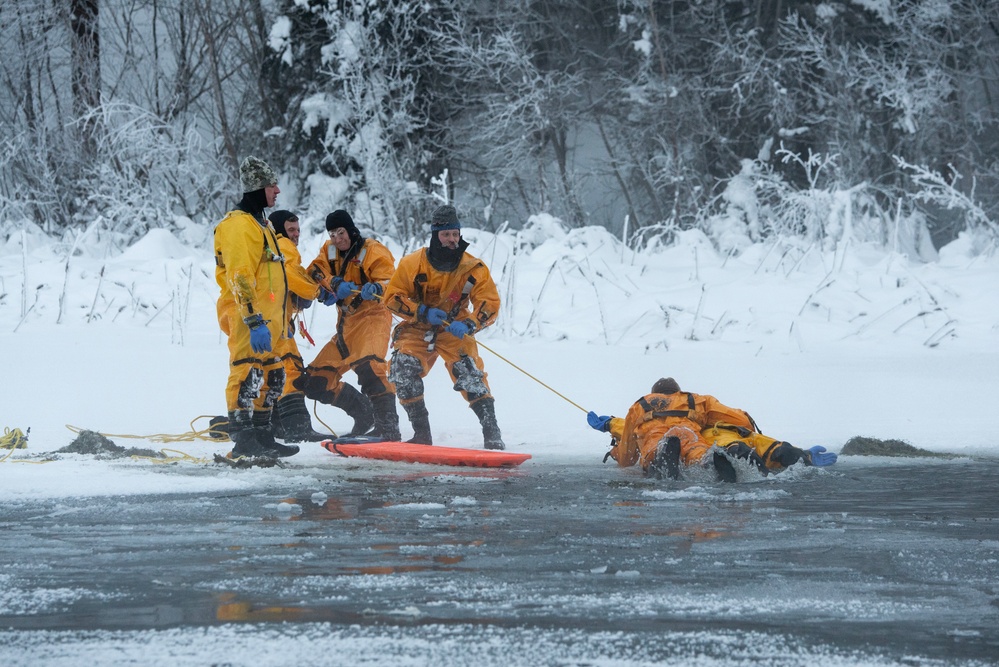 JBER firefighters conduct ice rescue training