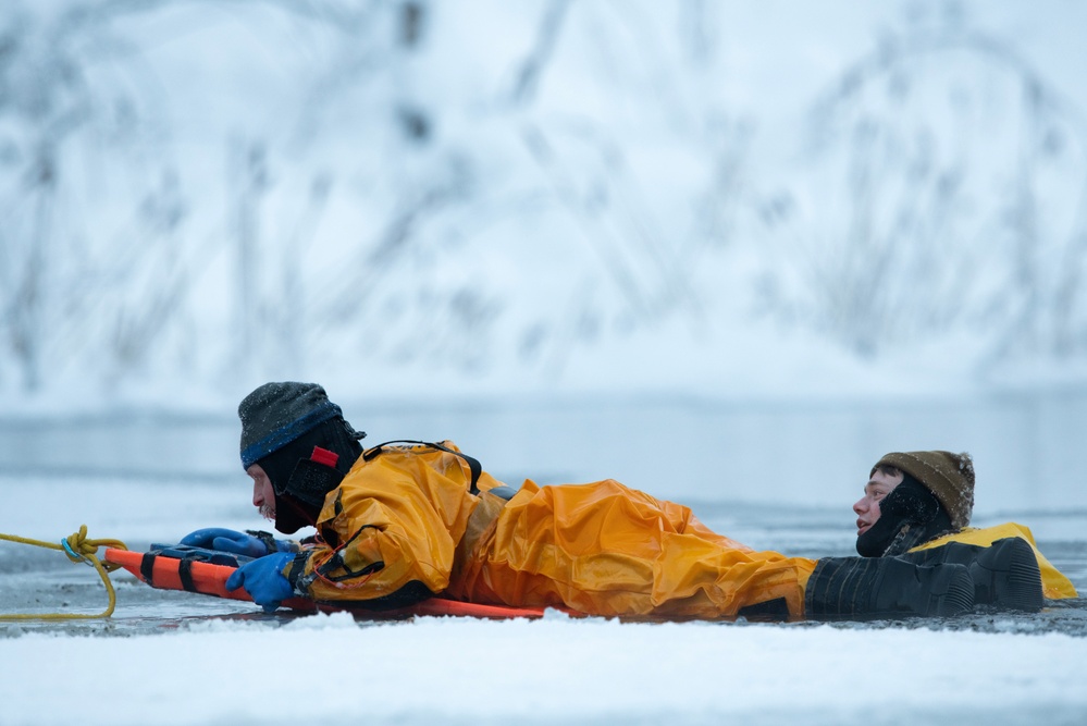 JBER firefighters conduct ice rescue training