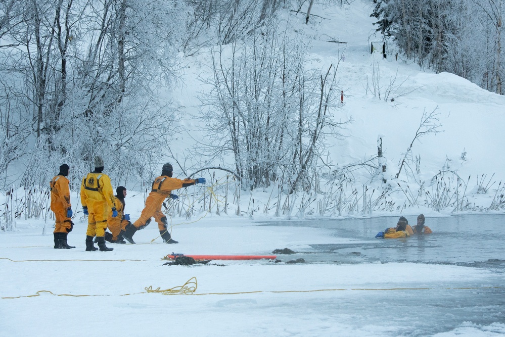 JBER firefighters conduct ice rescue training