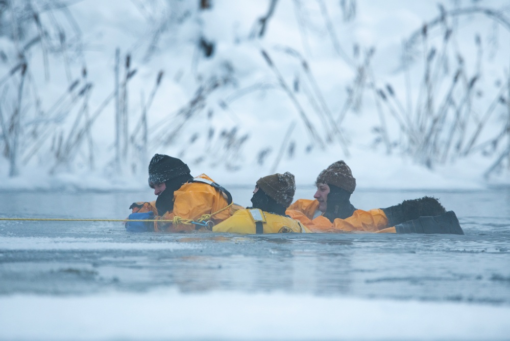 JBER firefighters conduct ice rescue training