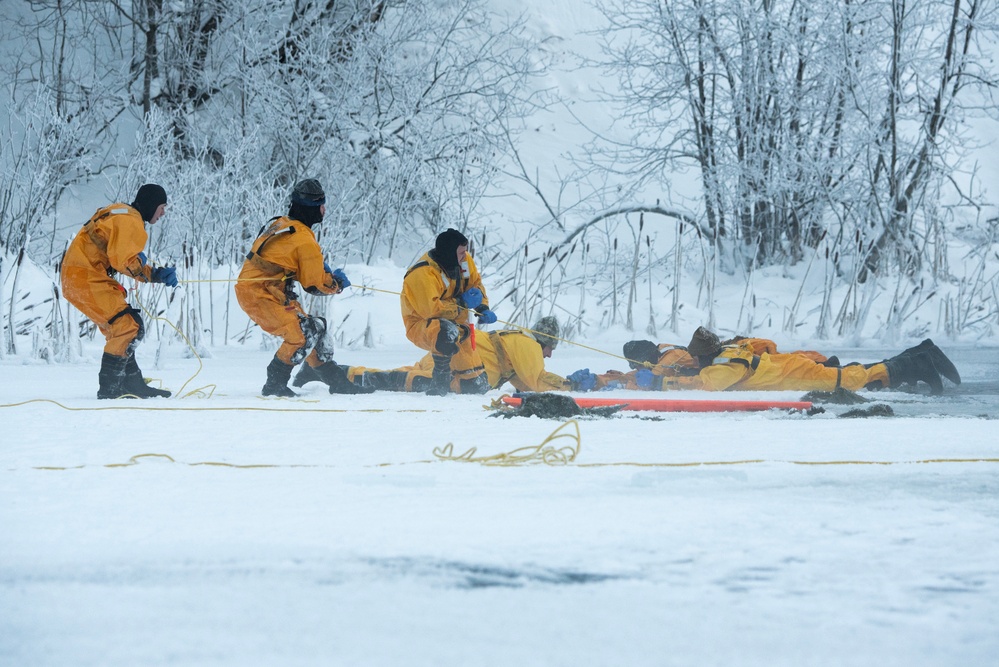 JBER firefighters conduct ice rescue training