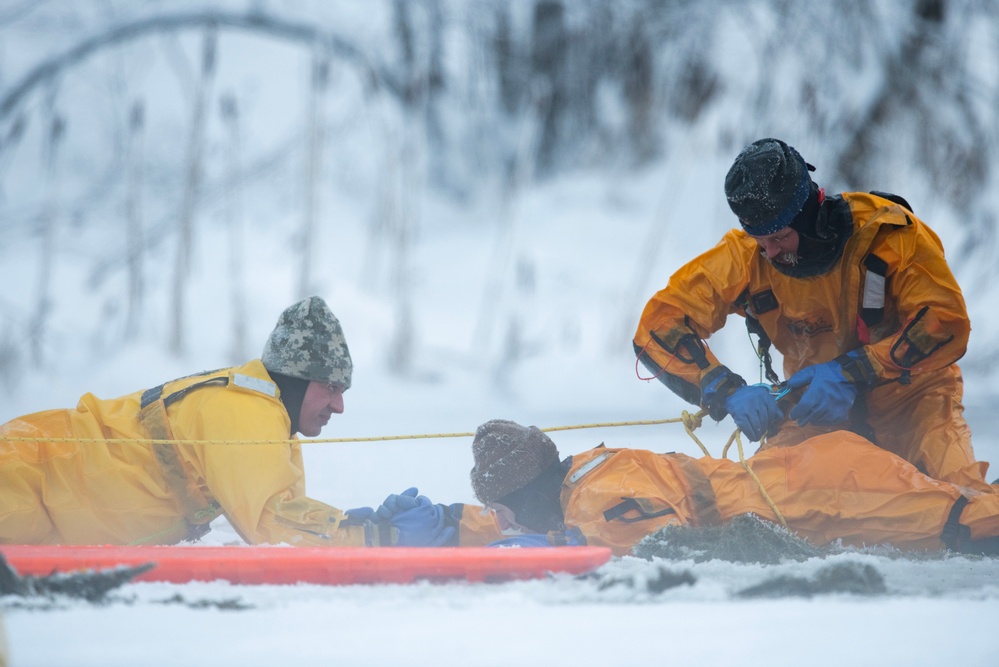 JBER firefighters conduct ice rescue training