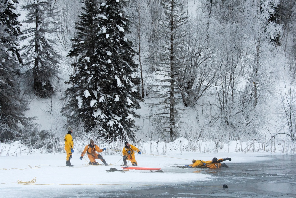 JBER firefighters conduct ice rescue training