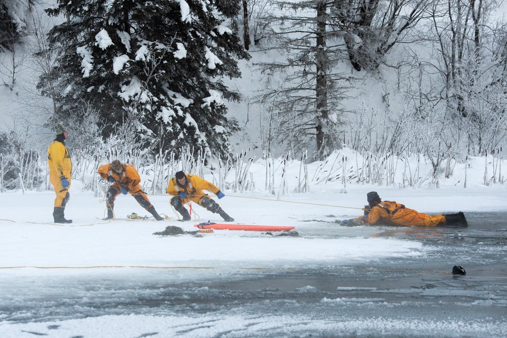 JBER firefighters conduct ice rescue training