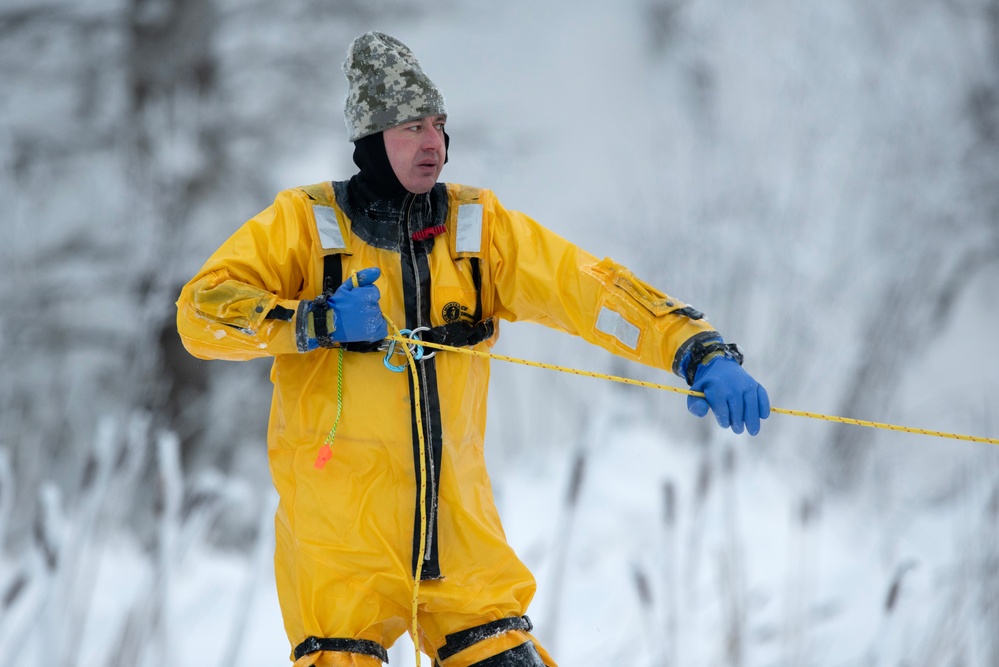 JBER firefighters conduct ice rescue training