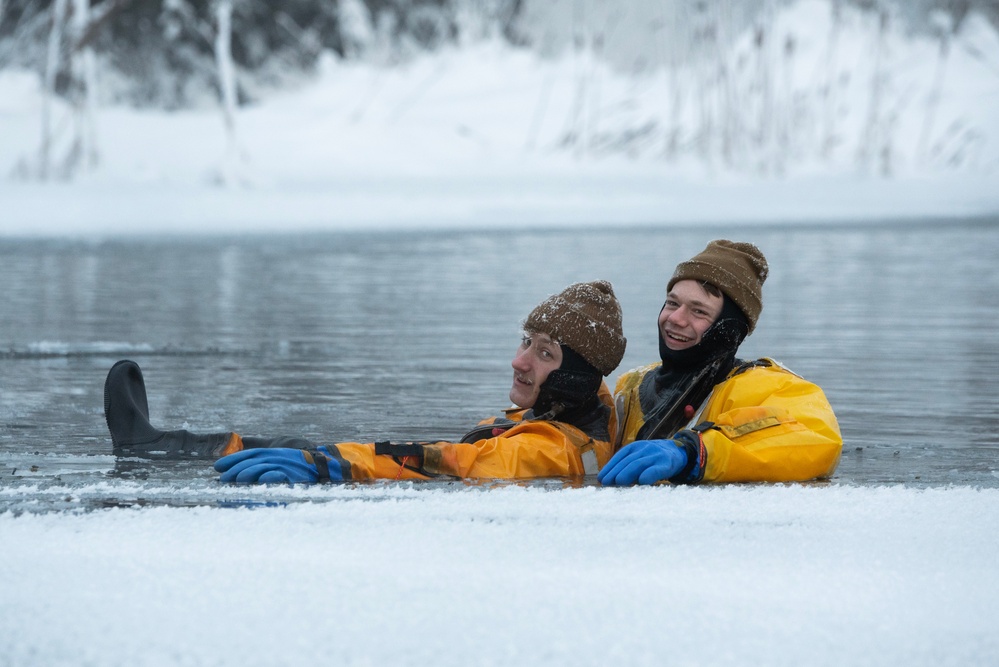 JBER firefighters conduct ice rescue training