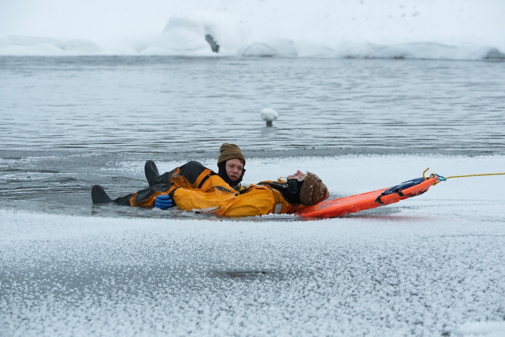 JBER firefighters conduct ice rescue training