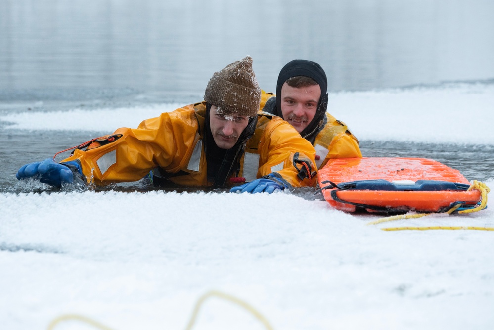 JBER firefighters conduct ice rescue training