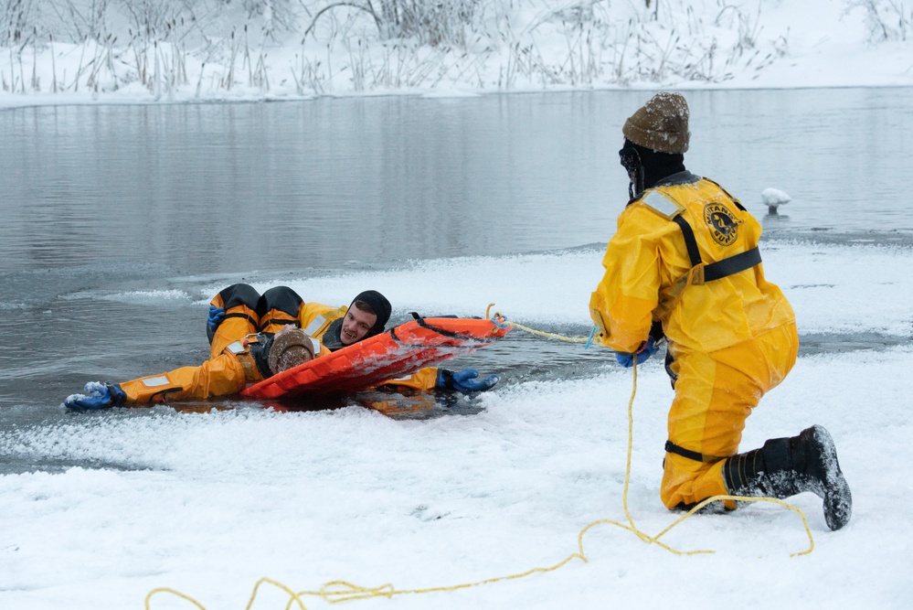 JBER firefighters conduct ice rescue training