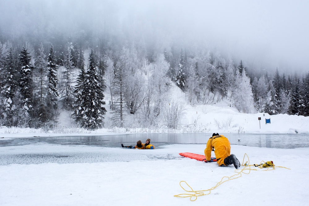 JBER firefighters conduct ice rescue training