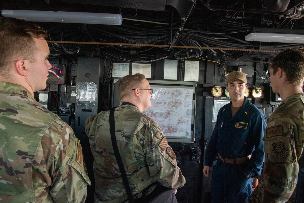 Airmen Tour Navy Ship