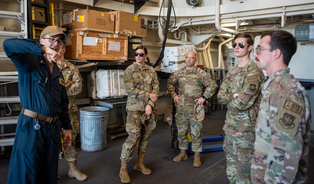 Airmen Tour Navy Ship